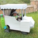 This baby Golfer in a Golf Cart stroller costume is so easy, all I used was: Single Stroller, large sheets of card board , several  different si
