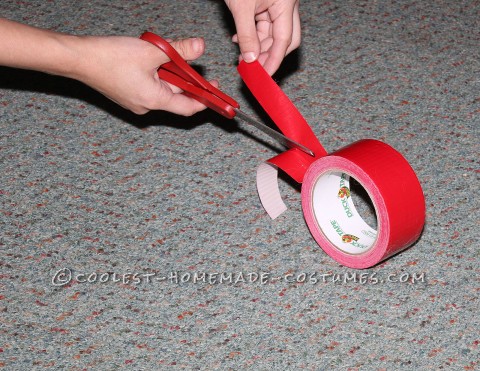 Cutting the Red Duct Tape in Thin Strips